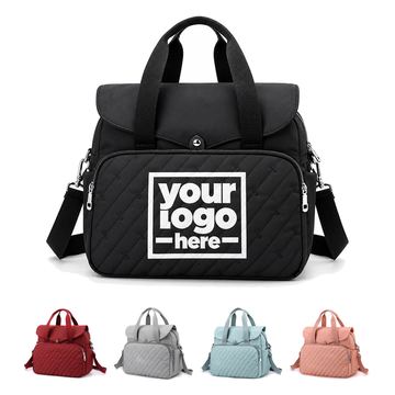 Backpack With Dual Top Handles And Quilted Front Pocket